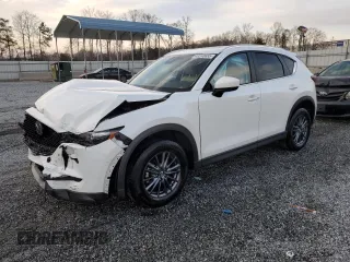 2020 Mazda CX-5 Touring with VIN JM3KFACM0L0863937, listed as a Copart auction lot 48240655 with 70,592 mi miles and Salvage Title. Bid and sale history available at carsss.com. Image 1.
