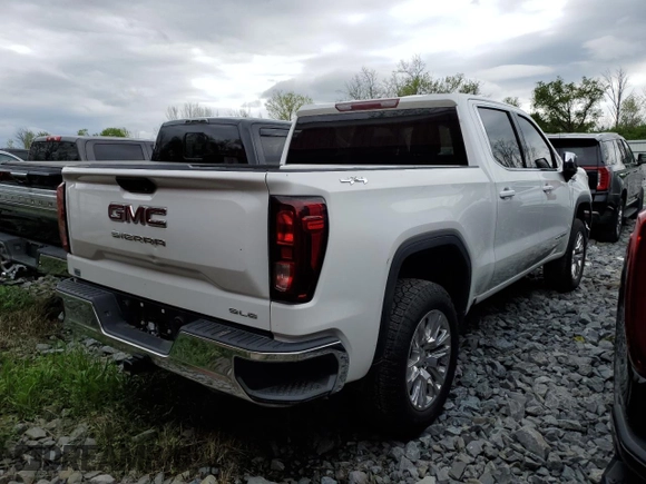 2023 GMC Sierra 1500 with VIN 1GTUUBE84PZ327510, listed as a Copart auction lot 51716385 with 30,590 mi miles and Salvage Title. Bid and sale history available at DreamBid. Image 3.