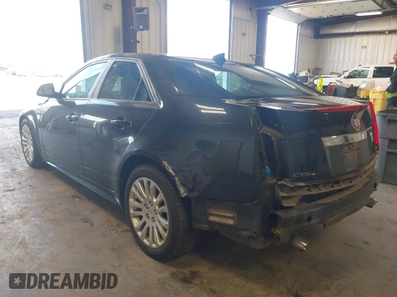 2011 Cadillac CTS Performance with VIN 1G6DL5ED6B0131490, listed as a IAAI auction lot 41980231 with 75,040 mi miles and . Bid and sale history available at DreamBid. Image 3.