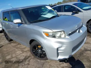 2012 Scion xB with VIN JTLZE4FE4C1143152, listed as a IAAI auction lot 41704452 with 174,846 mi miles. Bid and sale history available at carsss.com. Image 1.