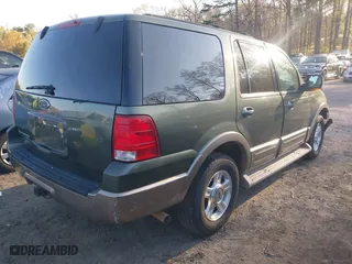 2004 Ford Expedition Eddie Bauer with VIN 1FMPU17L24LA97680, listed as a IAAI auction lot 41867080 with 296,279 mi miles. Bid and sale history available at carsss.com. Image 4.