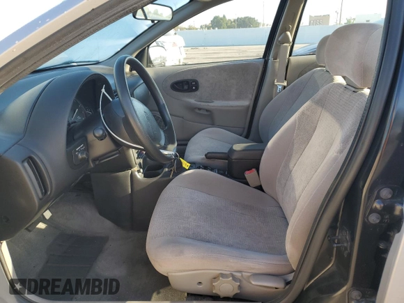 1999 Saturn SL with VIN 1G8ZK5274XZ367394, listed as a Copart auction lot 63863795 with 73,197 mi miles and Salvage title. Bid and sale history available at DreamBid. Image 7.