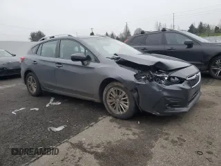2018 Subaru Impreza Premium with VIN 4S3GTAD6XJ3748930, listed as a Copart auction lot 88153825 with 119,686 mi miles and Salvage title. Bid and sale history available at DreamBid. Image 4.