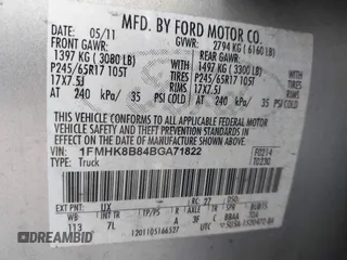 2011 Ford Explorer with VIN 1FMHK8B84BGA71822, listed as a IAAI auction lot 42362672 with 294,710 mi miles and . Bid and sale history available at DreamBid. Image 9.