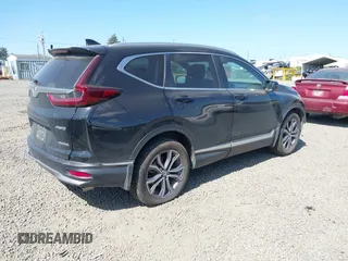 2021 Honda CR-V Touring with VIN 2HKRW2H96MH681908, listed as a IAAI auction lot 42082535 with 65,570 mi miles and . Bid and sale history available at DreamBid. Image 4.