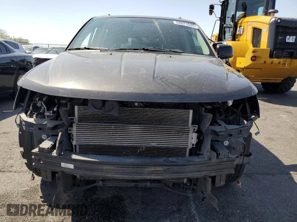 2017 Dodge Journey SXT with VIN 3C4PDCBB5HT701487, listed as a Copart auction lot 58821045 with 118,585 mi miles and Salvage title. Bid and sale history available at DreamBid. Image 5.