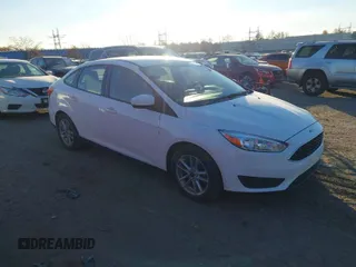 2018 Ford Focus SE z VIN 1FADP3F27JL207420, wystawiony jako IAAI lot #40816976 z przebiegiem 59 040 mil mil oraz . Historia ofert i sprzedaży dostępna na DreamBid. Obrazek 1.