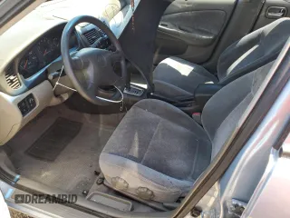 2000 Nissan Sentra XE with VIN 3N1CB51DXYL353188, listed as a Copart auction lot 56490115 with 190,643 mi miles and Salvage title. Bid and sale history available at DreamBid. Image 7.
