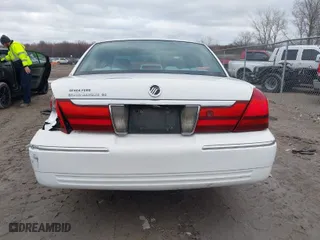 2004 Mercury Grand Marquis GS with VIN 2MEFM74W24X628573, listed as a IAAI auction lot 41922123 with 104,395 mi miles. Bid and sale history available at carsss.com. Image 16.
