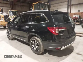 2020 Honda Pilot Touring 7-Passenger with VIN 5FNYF6H63LB032301, listed as a IAAI auction lot 38419333 with 50,433 mi miles and . Bid and sale history available at carsss.com. Image 3.