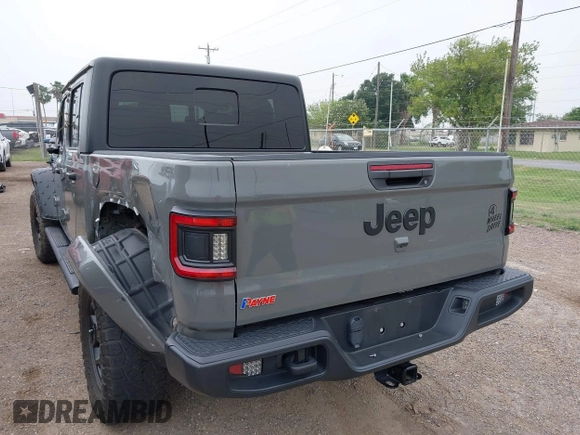 2022 Jeep Gladiator Texas Trail z VIN 1C6HJTAG2NL176011, wystawiony jako IAAI lot #42193864 z przebiegiem 27 219 mil mil oraz . Historia ofert i sprzedaży dostępna na DreamBid. Obrazek 3.