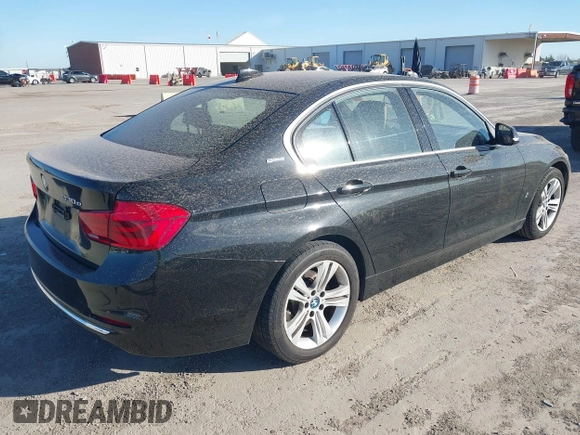 2017 BMW 3 Series 330e iPerformance with VIN WBA8E1C34HA156688, listed as a IAAI auction lot 41753490 with 74,130 mi miles. Bid and sale history available at carsss.com. Image 4.