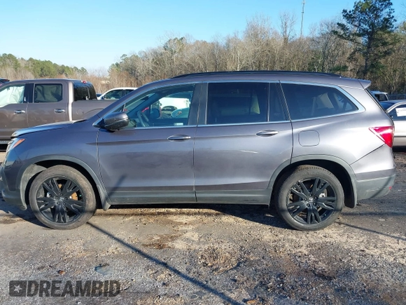 2022 Honda Pilot Special Edition with VIN 5FNYF5H26NB014269, listed as a IAAI auction lot 41239868 with 51,005 mi miles and . Bid and sale history available at carsss.com. Image 14.
