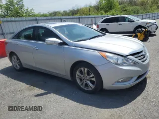 2013 Hyundai Sonata Limited with VIN 5NPEC4AC6DH797229, listed as a Copart auction lot 53649925 with 171,550 mi miles and Salvage Title. Bid and sale history available at DreamBid. Image 4.