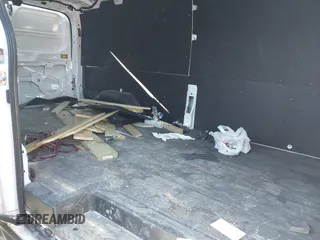 2022 Ford Transit Cargo with VIN 1FTBR2Y84NKA64395, listed as a IAAI auction lot 41359067 with 59,393 mi miles and . Bid and sale history available at DreamBid. Image 8.