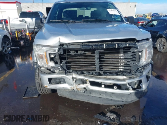2019 Ford F-150 XL with VIN 1FTEW1C54KFD48711, listed as a IAAI auction lot 41601800 with 94,295 mi miles and . Bid and sale history available at carsss.com. Image 6.
