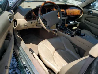 2002 Jaguar XK with VIN SAJDA42C62NA25816, listed as a Copart auction lot 52802525 with Not Provided miles and Salvage Title. Bid and sale history available at DreamBid. Image 8.