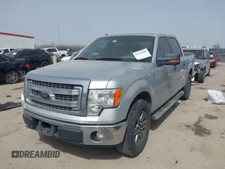 2013 Ford F-150 XL with VIN 1FTFW1CF6DKG22708, listed as a IAAI auction lot 41725908 with 155,530 mi miles and . Bid and sale history available at carsss.com. Image 2.