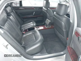 2005 Volkswagen Phaeton z VIN WVWBH03D858004483, wystawiony jako IAAI lot #41412475 z przebiegiem 146 072 mil mil oraz . Historia ofert i sprzedaży dostępna na DreamBid. Obrazek 8.