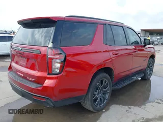2024 Chevrolet Tahoe RST with VIN 1GNSCRKD7RR409245, listed as a IAAI auction lot 42133470 with 11,051 mi miles and . Bid and sale history available at DreamBid. Image 4.