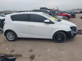 2014 Chevrolet Sonic LT with VIN 1G1JC6SB2E4215465, listed as a IAAI auction lot 41140292 with 93,224 mi miles. Bid and sale history available at carsss.com. Image 13.