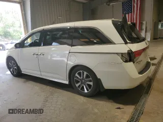 2016 Honda Odyssey Touring Elite with VIN 5FNRL5H91GB070424, listed as a Copart auction lot 55583075 with 115,709 mi miles and Salvage Title. Bid and sale history available at DreamBid. Image 2.