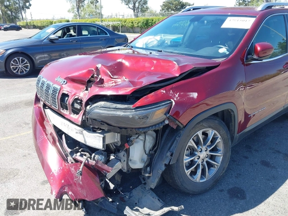 2019 Jeep Cherokee Latitude Plus with VIN 1C4PJMLB0KD231587, listed as a IAAI auction lot 42015017 with 116,463 mi miles and . Bid and sale history available at DreamBid. Image 6.