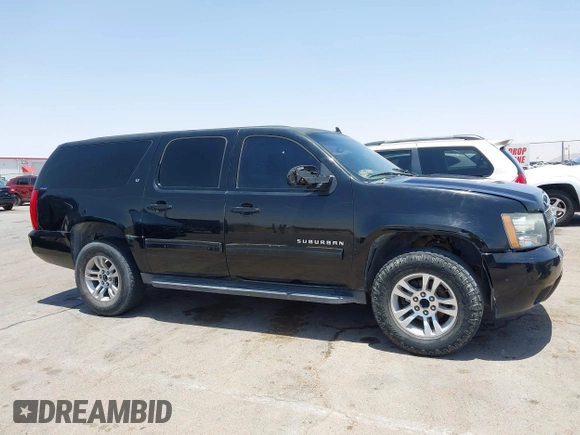 2013 Chevrolet Suburban LT z VIN 1GNSCJE02DR176393, wystawiony jako IAAI lot #42483598 z przebiegiem 266 075 mil mil oraz . Historia ofert i sprzedaży dostępna na DreamBid. Obrazek 13.
