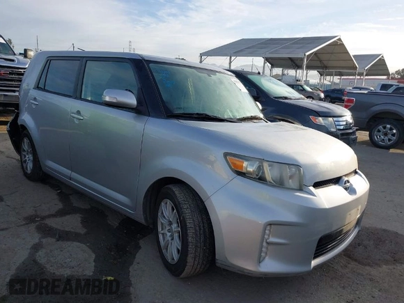 2013 Scion xB with VIN JTLZE4FE2DJ047490, listed as a IAAI auction lot 41812925 with 154,191 mi miles. Bid and sale history available at carsss.com. Image 1.