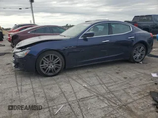 2018 Maserati Ghibli z VIN ZAM57XSA5J1287424, wystawiony jako Copart lot #71215154 z przebiegiem 20 029 mil mil oraz Szkoda całkowita • Salvage title. Historia ofert i sprzedaży dostępna na DreamBid. Obrazek 1.