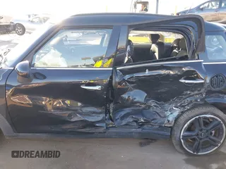 2013 MINI Countryman S z VIN WMWZC3C57DWP22928, wystawiony jako IAAI lot #41665753 z przebiegiem Nie podano mil oraz . Historia ofert i sprzedaży dostępna na DreamBid. Obrazek 14.
