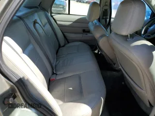 2004 Ford Crown Victoria LX z VIN 2FAFP74W14X130606, wystawiony jako Copart lot #54120085 z przebiegiem 221 700 mil mil oraz Szkody całkowita. Historia ofert i sprzedaży dostępna na DreamBid. Obrazek 10.