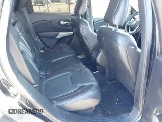 2018 Jeep Cherokee Trailhawk Leather Plus with VIN 1C4PJMBXXJD572667, listed as a IAAI auction lot 42216477 with 85,890 mi miles and . Bid and sale history available at DreamBid. Image 8.