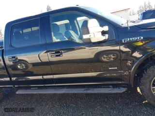 2015 Ford F-150 XLT w/HD Payload Pkg with VIN 1FTFW1EG5FFC13942, listed as a IAAI auction lot 41392709 with 196,416 mi miles. Bid and sale history available at carsss.com. Image 14.