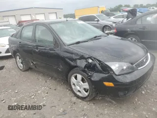 2005 Ford Focus S with VIN 1FAFP34N45W285454, listed as a Copart auction lot 59043485 with 165,071 mi miles and Salvage title. Bid and sale history available at DreamBid. Image 4.