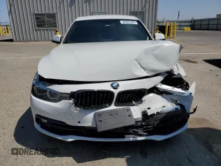 2018 BMW 3 Series 328d with VIN WBA8E5C56JA507664, listed as a Copart auction lot 60083895 with 94,331 mi miles and Salvage title. Bid and sale history available at DreamBid. Image 5.