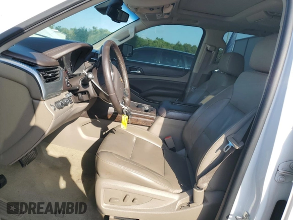 2016 Chevrolet Tahoe LT with VIN 1GNSKBKC7GR243372, listed as a Copart auction lot 55021225 with 170,808 mi miles and Salvage title. Bid and sale history available at DreamBid. Image 7.