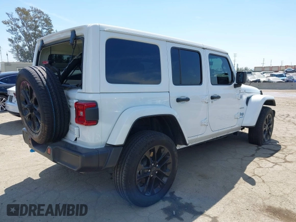 2024 Jeep Wrangler Sahara with VIN 1C4RJXP61RW126904, listed as a IAAI auction lot 41998215 with 32,034 mi miles and . Bid and sale history available at DreamBid. Image 4.