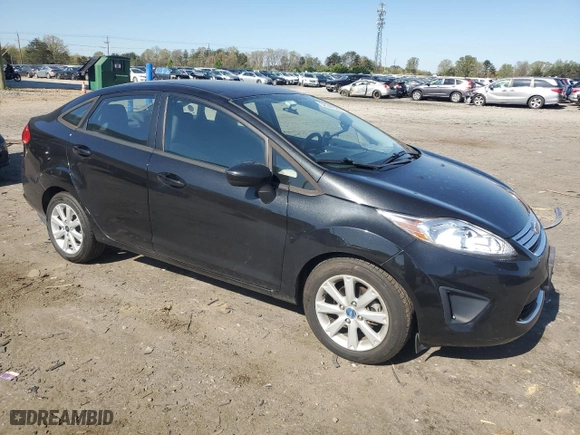 2011 Ford Fiesta SE with VIN 3FADP4BJ4BM109514, listed as a Copart auction lot 52544585 with 146,793 mi miles and Salvage Title. Bid and sale history available at carsss.com. Image 4.
