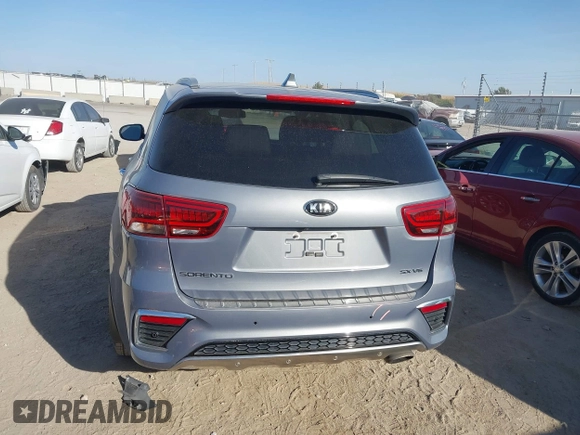 2020 Kia Sorento SX z VIN 5XYPKDA58LG686586, wystawiony jako IAAI lot #40502030 z przebiegiem 76 546 mil mil oraz . Historia ofert i sprzedaży dostępna na DreamBid. Obrazek 16.