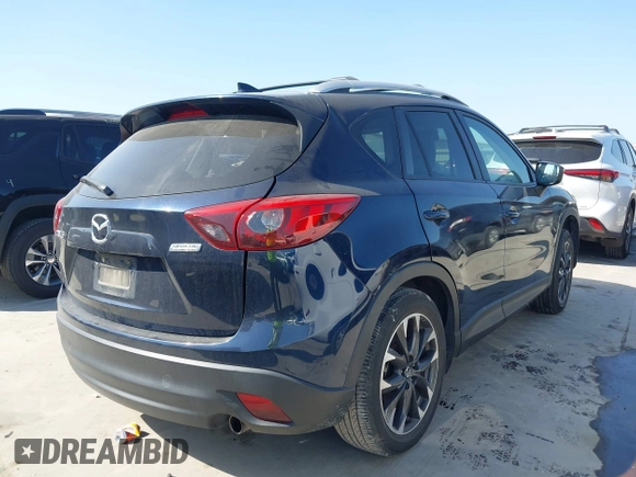 2016 Mazda CX-5 Grand Touring z VIN JM3KE2DY3G0797321, wystawiony jako IAAI lot #42017174 z przebiegiem 65 505 mil mil oraz . Historia ofert i sprzedaży dostępna na DreamBid. Obrazek 4.