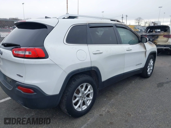 2015 Jeep Cherokee Latitude z VIN 1C4PJMCSXFW773712, wystawiony jako IAAI lot #41887850 z przebiegiem Nie podano mil oraz . Historia ofert i sprzedaży dostępna na DreamBid. Obrazek 4.