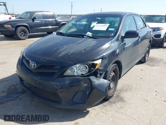 2012 Toyota Corolla L with VIN 5YFBU4EE5CP069365, listed as a IAAI auction lot 41852689 with 220,730 mi miles. Bid and sale history available at carsss.com. Image 2.
