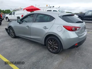 2014 Mazda 3 i Grand Touring with VIN JM1BM1M73E1216596, listed as a IAAI auction lot 41621165 with 127,235 mi miles and . Bid and sale history available at DreamBid. Image 3.