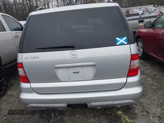 2002 Mercedes-Benz M-Class with VIN 4JGAB54E92A352889, listed as a IAAI auction lot 41805001 with 174,758 mi miles. Bid and sale history available at carsss.com. Image 16.