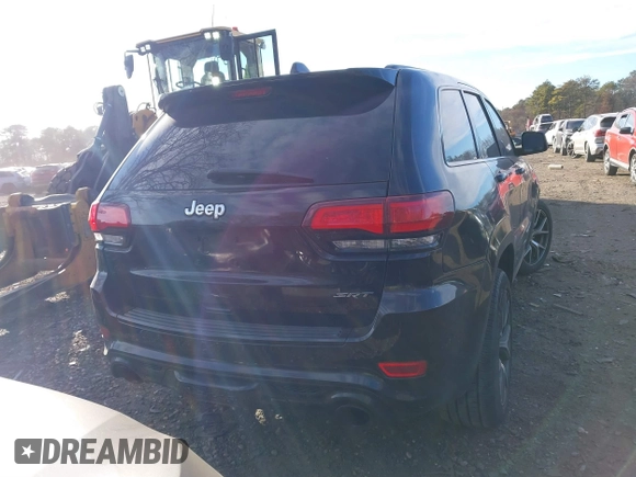 2017 Jeep Grand Cherokee SRT with VIN 1C4RJFDJ3HC694736, listed as a IAAI auction lot 41292771 with 79,966 mi miles. Bid and sale history available at carsss.com. Image 16.