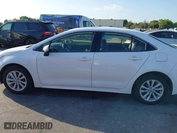2024 Toyota Corolla Hybrid LE with VIN JTDBCMFE2RJ031865, listed as a IAAI auction lot 41602715 with 10,892 mi miles. Bid and sale history available at carsss.com. Image 14.