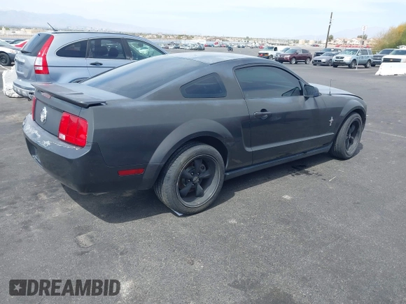 2007 Ford Mustang Deluxe with VIN 1ZVFT80N275219256, listed as a IAAI auction lot 41932447 with Not Provided miles. Bid and sale history available at carsss.com. Image 4.
