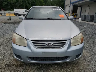 2007 Kia Spectra EX z VIN KNAFE121775389527, wystawiony jako Copart lot #56517285 z przebiegiem 340 861 mil mil oraz Szkoda całkowita • Salvage title. Historia ofert i sprzedaży dostępna na DreamBid. Obrazek 5.