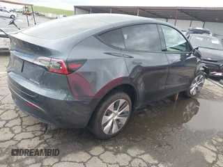 2022 Tesla Model Y Long Range with VIN 7SAYGDEE8NF317482, listed as a IAAI auction lot 41806043 with 32,108 mi miles and . Bid and sale history available at carsss.com. Image 4.